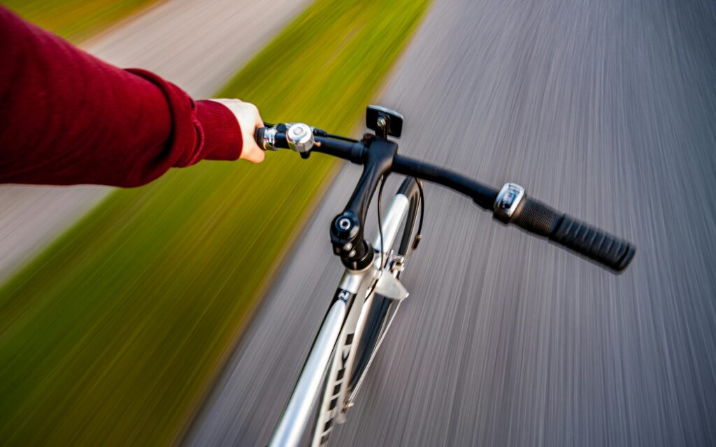 Experience the thrill of biking in Aalborg with this dynamic action shot.